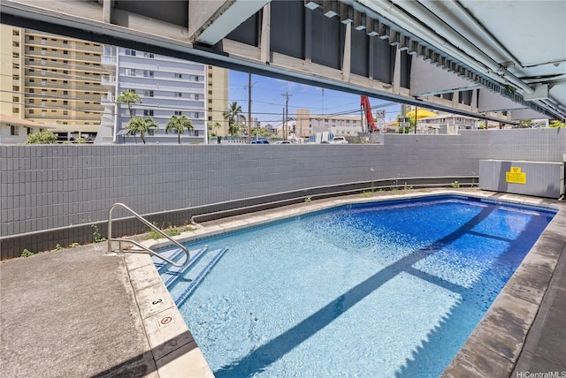 1605 Pensacola St Unit 104, Honolulu, HI 96822 - view of pool with a fenced backyard