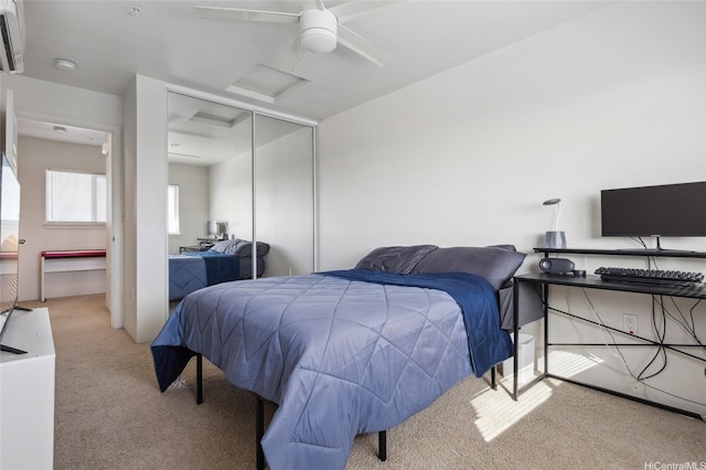 642 Kakala St Unit 1311, Kapolei, HI 96707 - bedroom featuring carpet, a closet, a wall unit AC, ceiling fan, and attic access