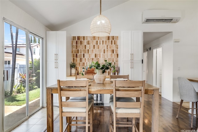 91-1516 Keonekapu St, Ewa Beach, HI 96706 - dining space featuring a wall mounted AC and lofted ceiling