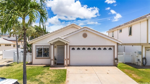 91-1516 Keonekapu St, Ewa Beach, HI 96706 - view of front of house with concrete driveway, an attached garage, a gate, and stucco siding