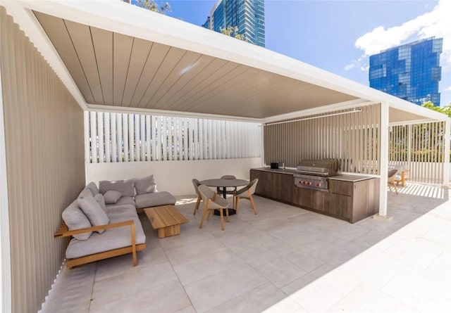 1000 Auahi St Unit 1600, Honolulu, HI 96814 - view of patio with exterior kitchen, outdoor dining area, and a city view