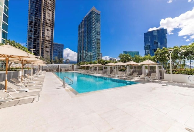 1000 Auahi St Unit 1600, Honolulu, HI 96814 - community pool featuring a city view and a patio area