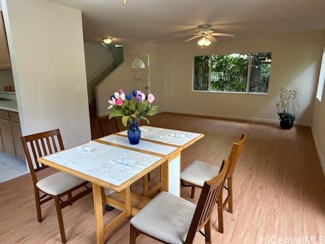2556 Palolo Pl Unit 4B, Honolulu, HI 96816 - dining room with light wood-style flooring and ceiling fan
