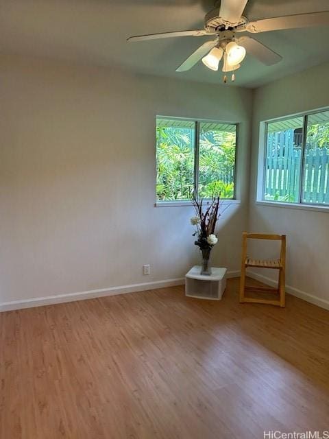 2556 Palolo Pl Unit 4B, Honolulu, HI 96816 - empty room featuring light wood-style flooring and a ceiling fan
