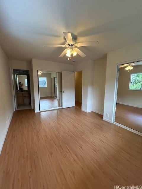 2556 Palolo Pl Unit 4B, Honolulu, HI 96816 - unfurnished bedroom with wood finished floors and ceiling fan