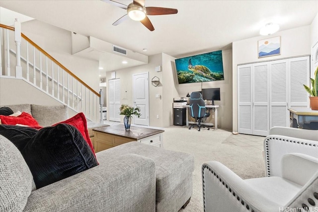 1180 Kakala St Unit 608, Kapolei, HI 96707 - living room with an office area, a ceiling fan, stairs, and carpet flooring