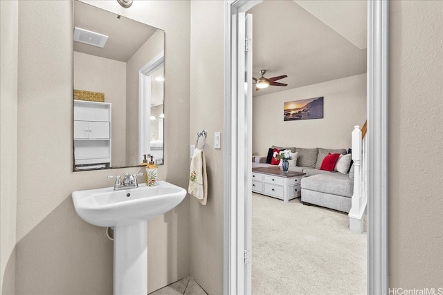 1180 Kakala St Unit 608, Kapolei, HI 96707 - bathroom with ceiling fan and a textured wall