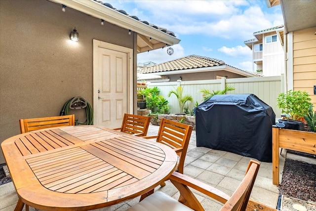 1180 Kakala St Unit 608, Kapolei, HI 96707 - view of patio with outdoor dining area and a grill