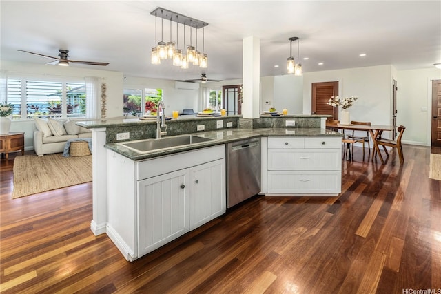 68-17 Laau Paina Pl, Waialua, HI 96791 - kitchen with stainless steel dishwasher, a ceiling fan, open floor plan, dark wood finished floors, and recessed lighting