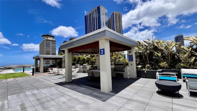629 Keeaumoku St Unit 2310, Honolulu, HI 96814 - view of patio with a gazebo and area for grilling