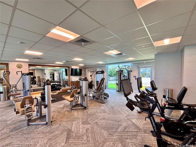629 Keeaumoku St Unit 2310, Honolulu, HI 96814 - exercise room featuring a paneled ceiling and carpet floors
