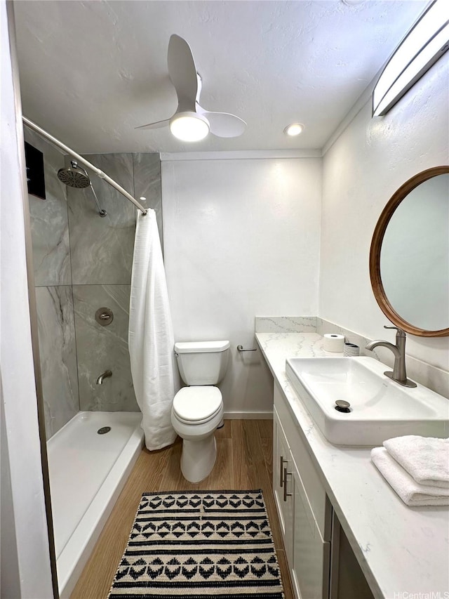 57-68 Eleku Kuilima Pl Unit 657, Kahuku, HI 96731 - full bath featuring wood finished floors, vanity, a tile shower, and ceiling fan