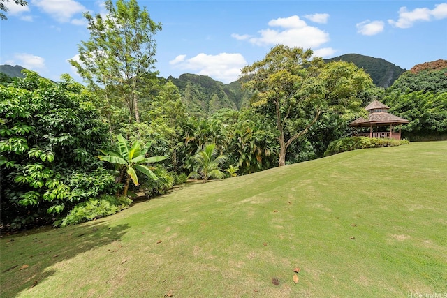 46-478 Haiku Plantations Dr, Kaneohe, HI 96744 - view of green lawn featuring a mountain view, a gazebo, and view of golf course