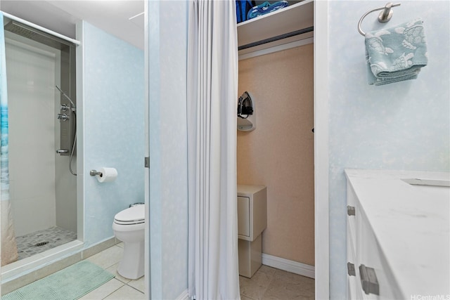 444 Kanekapolei St Unit 501, Honolulu, HI 96815 - bathroom with a shower stall, tile patterned flooring, and vanity