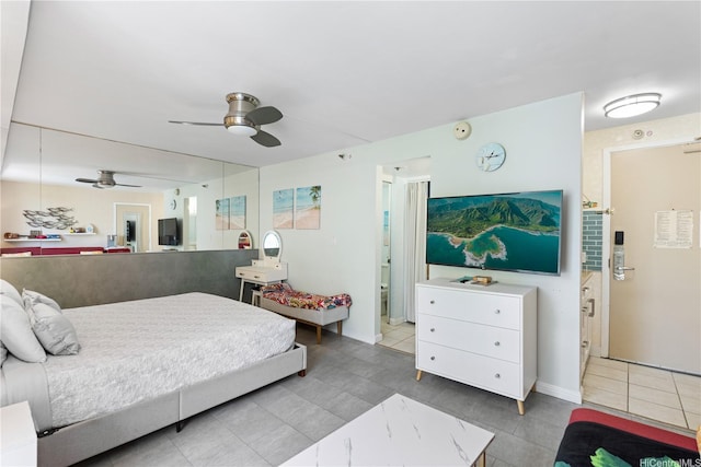 444 Kanekapolei St Unit 501, Honolulu, HI 96815 - tiled bedroom with a ceiling fan and baseboards