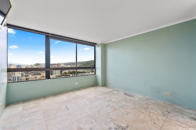 2499 Kapiolani Blvd Unit 2708, Honolulu, HI 96826 - empty room featuring crown molding and a city view