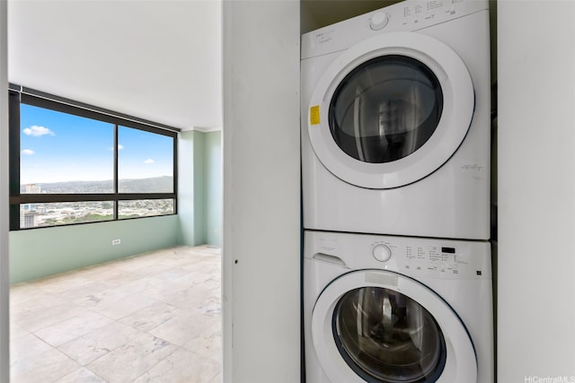 2499 Kapiolani Blvd Unit 2708, Honolulu, HI 96826 - laundry room with stacked washer and clothes dryer