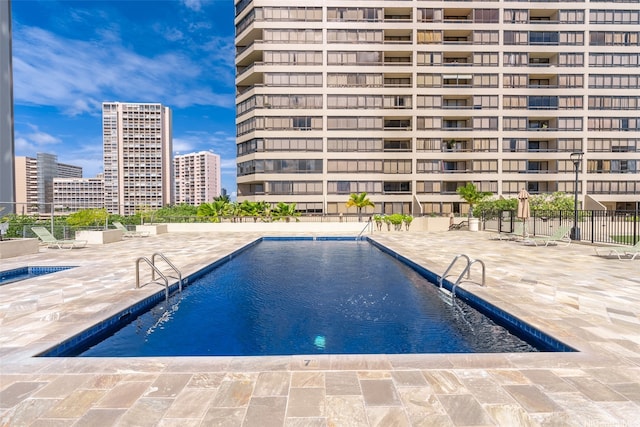 2499 Kapiolani Blvd Unit 2708, Honolulu, HI 96826 - community pool featuring a patio area and a view of city