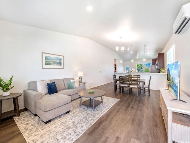 91-1512 Ulaula Loop, Ewa Beach, HI 96706 - living area with a chandelier, a wall unit AC, dark wood-type flooring, and vaulted ceiling