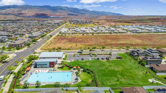 91-1512 Ulaula Loop, Ewa Beach, HI 96706 - aerial view of property's location featuring nearby suburban area and a mountainous background