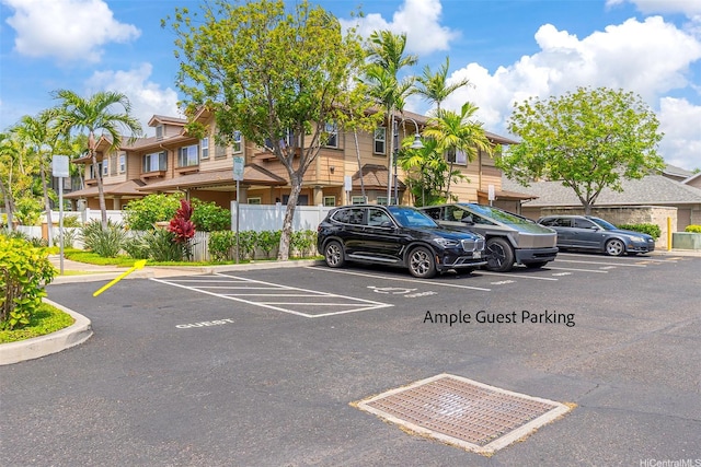 91-2070 Kaioli St Unit 4404, Ewa Beach, HI 96706 - uncovered parking lot featuring a residential view