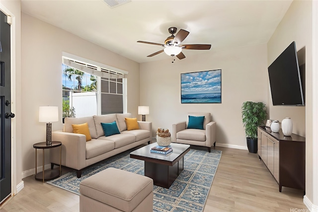 91-2070 Kaioli St Unit 4404, Ewa Beach, HI 96706 - living room with light wood-style floors and a ceiling fan