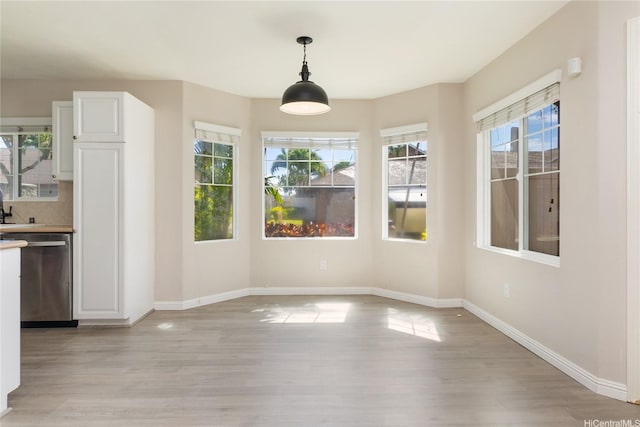 91-2070 Kaioli St Unit 4404, Ewa Beach, HI 96706 - unfurnished dining area featuring light wood-type flooring