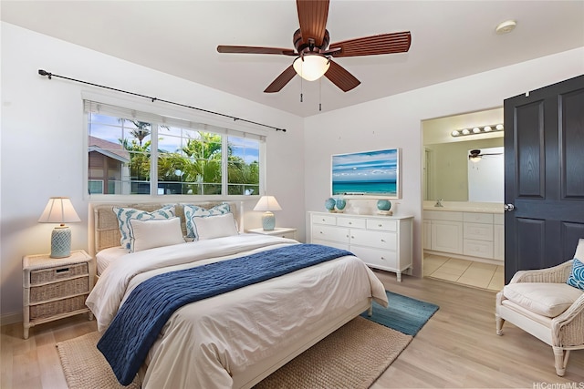 91-2070 Kaioli St Unit 4404, Ewa Beach, HI 96706 - bedroom featuring light wood-type flooring, connected bathroom, and ceiling fan