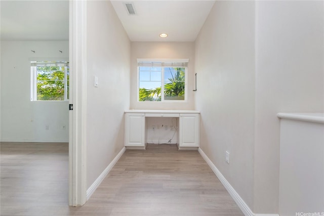 91-2070 Kaioli St Unit 4404, Ewa Beach, HI 96706 - hallway with light wood finished floors, healthy amount of natural light, an office area, and recessed lighting