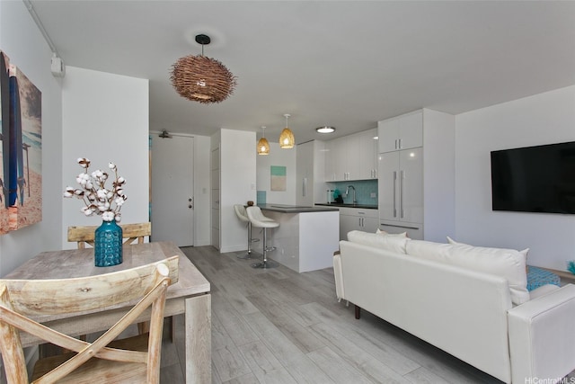 320 Liliuokalani Ave Unit 602, Honolulu, HI 96815 - living area featuring light wood-style flooring