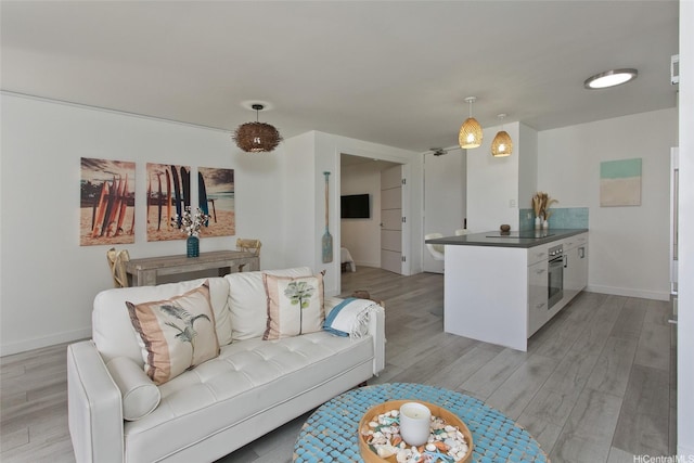 320 Liliuokalani Ave Unit 602, Honolulu, HI 96815 - living area featuring light wood-type flooring