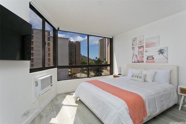 320 Liliuokalani Ave Unit 602, Honolulu, HI 96815 - bedroom with wood finished floors