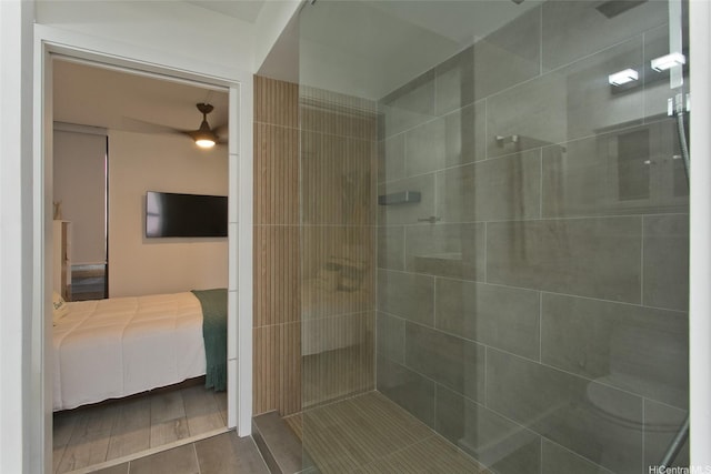 320 Liliuokalani Ave Unit 602, Honolulu, HI 96815 - ensuite bathroom featuring a tile shower and ceiling fan