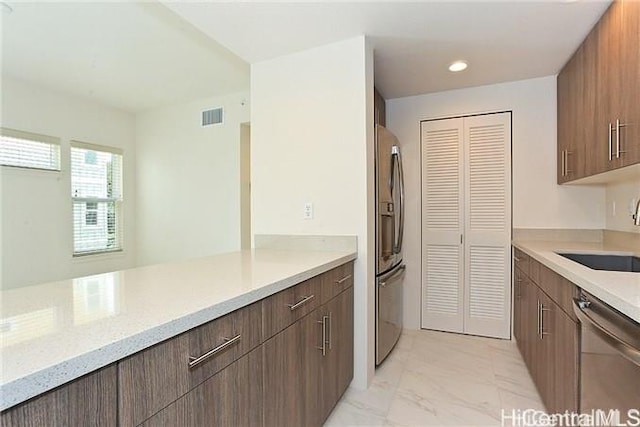 455 Kailua Rd Unit 4204, Kailua, HI 96734 - kitchen featuring stainless steel appliances, light marble finish floors, light stone counters, and recessed lighting