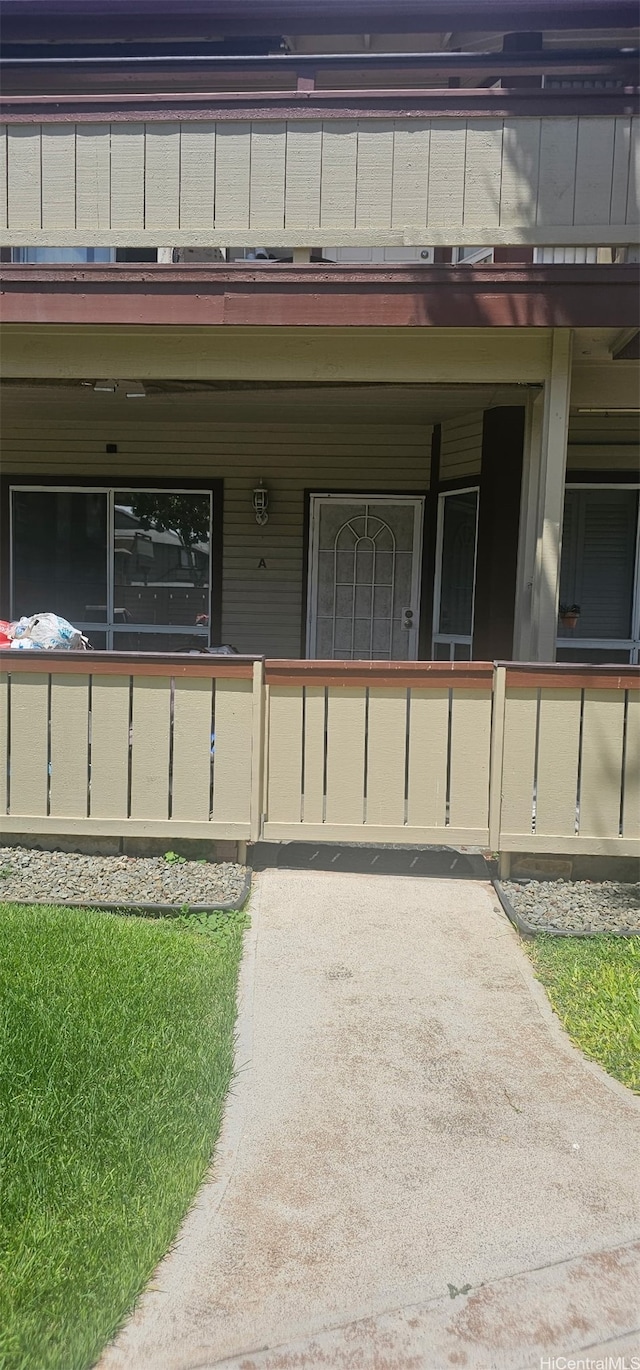 91-665 Puamaeole St Unit 32A, Ewa Beach, HI 96706 - doorway to property with a porch