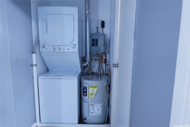 94-49 Waipahu St Unit 314, Waipahu, HI 96797 - washroom with estacked washer and dryer, electric water heater, and electric panel