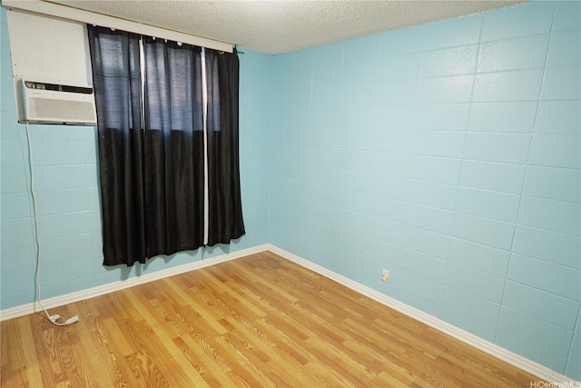94-49 Waipahu St Unit 314, Waipahu, HI 96797 - empty room with light wood-type flooring and a textured ceiling