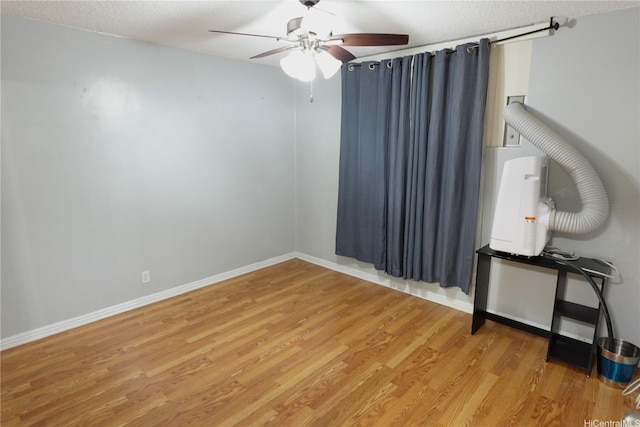 94-49 Waipahu St Unit 314, Waipahu, HI 96797 - spare room with light wood-type flooring, ceiling fan, and a textured ceiling