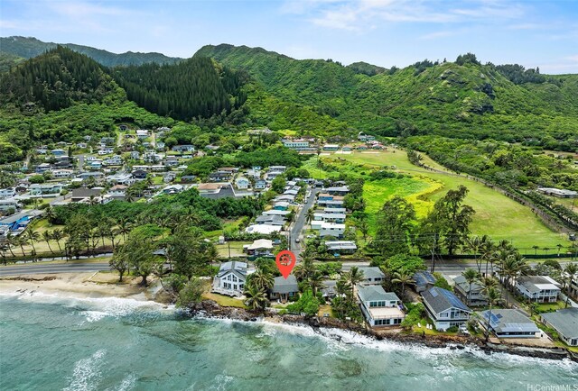 54-217 Kamehameha Hwy, Hauula, HI 96717 - aerial view of residential area with a heavily wooded area and a water and mountain view