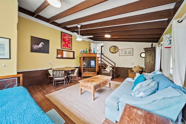 54-217 Kamehameha Hwy, Hauula, HI 96717 - living area featuring beam ceiling, ceiling fan, a wainscoted wall, and wood finished floors