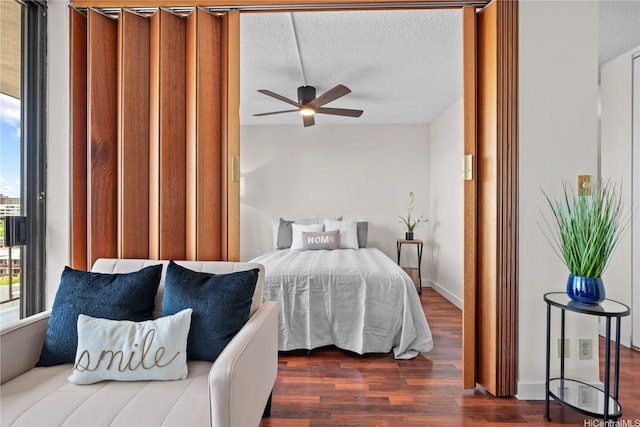 1561 Pensacola St Unit 1104, Honolulu, HI 96822 - bedroom featuring dark wood finished floors and a textured ceiling