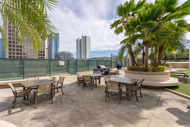 1296 Kapiolani Blvd Unit Ii2407, Honolulu, HI 96814 - view of patio / terrace with outdoor dining space