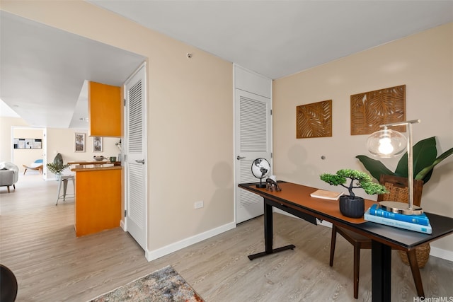 1296 Kapiolani Blvd Unit Ii2407, Honolulu, HI 96814 - office area featuring light wood-type flooring and baseboards