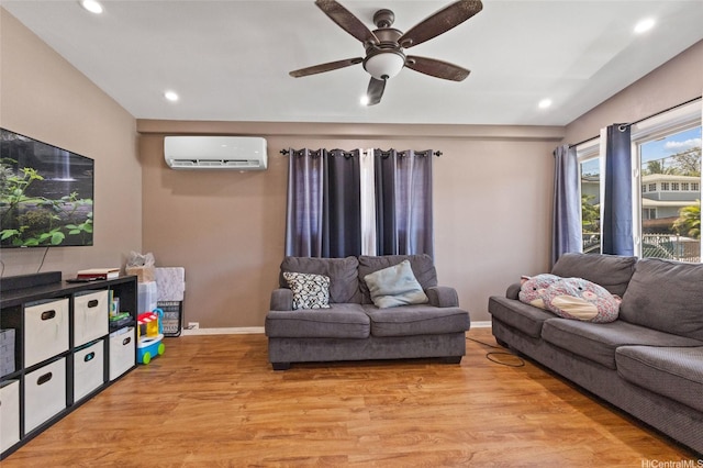 94-555 Awamoi St, Waipahu, HI 96797 - living area with a wall mounted AC, light wood-style flooring, ceiling fan, and recessed lighting