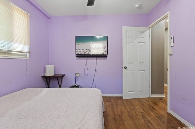 94-555 Awamoi St, Waipahu, HI 96797 - bedroom with dark wood finished floors and baseboards