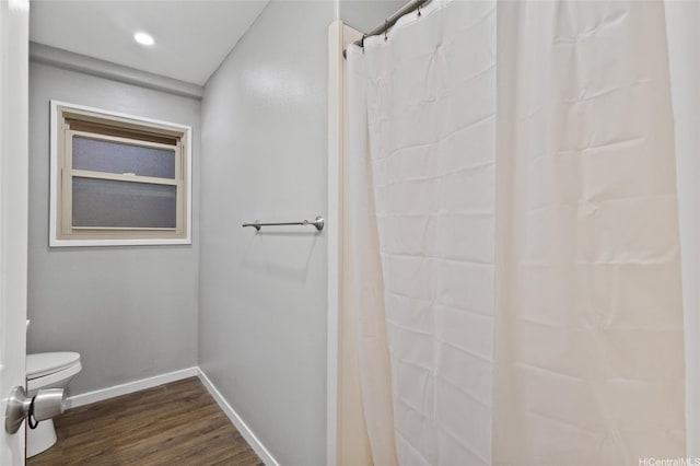 94-555 Awamoi St, Waipahu, HI 96797 - bathroom with wood finished floors and curtained shower