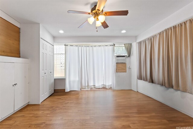 94-555 Awamoi St, Waipahu, HI 96797 - unfurnished bedroom with recessed lighting, wood finished floors, and a ceiling fan