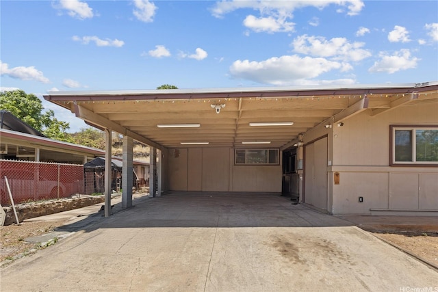 94-555 Awamoi St, Waipahu, HI 96797 - view of parking with concrete driveway and a carport