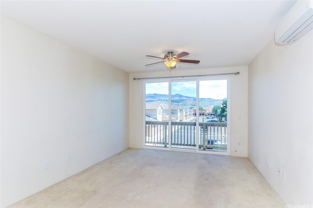 1020 Kakala St Unit 816, Kapolei, HI 96707 - unfurnished room featuring a wall unit AC, carpet flooring, a ceiling fan, and a mountain view