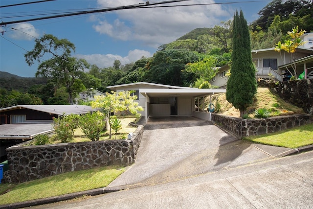 2410 Halenoho Pl, Honolulu, HI 96816 - mid-century home featuring concrete driveway and a carport
